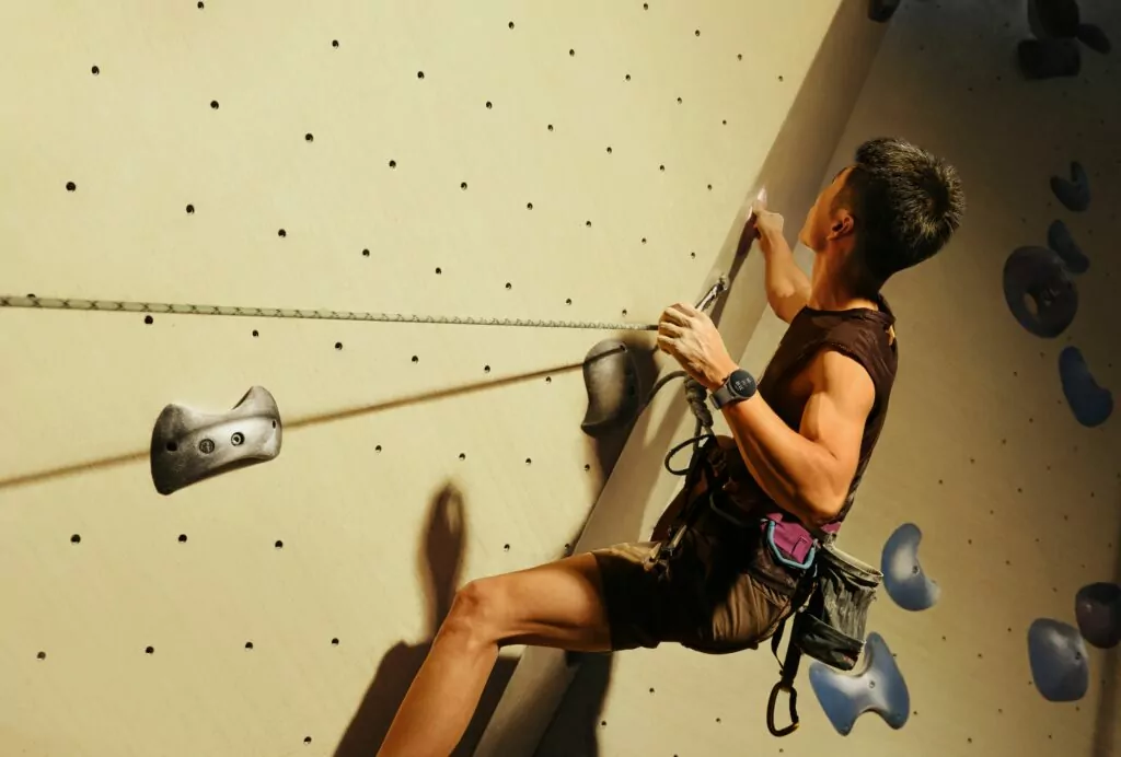 Amazfit GTR 3 being worn by a male climber on a climbing wall