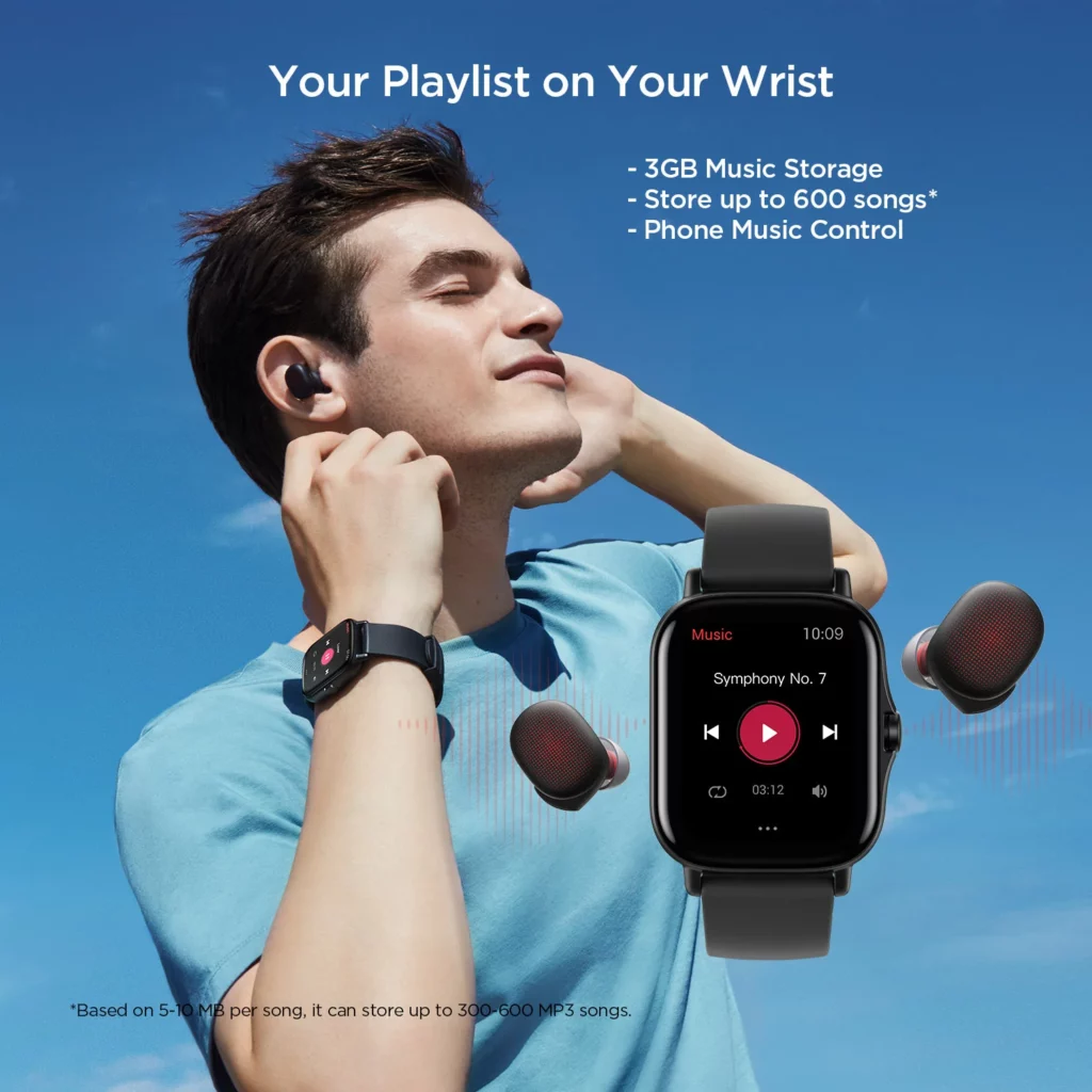 Amazfit GTS 2 in midnight black being worn by a man in a blue tshirt listening to music through the Bluetooth connected headphones