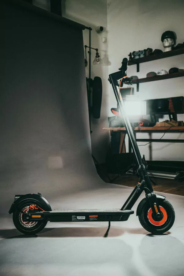 Inmotion Climber Electric Scooter side on view with the office in the background