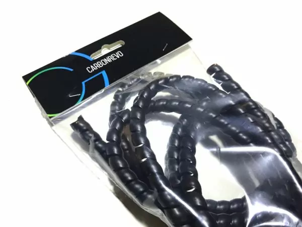 Carbon Revo Black Cable Wrap for electric scooters on a white background