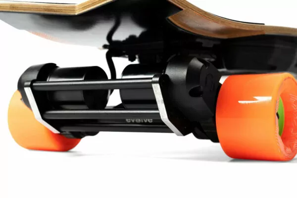 evolve stoke mini eskate with orange wheels